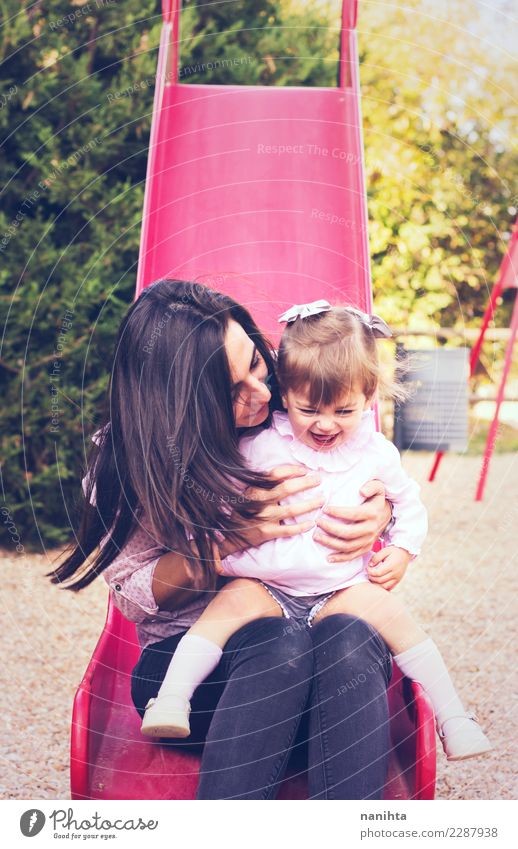 Mother and daughter enjoying the day in the park Lifestyle Style Joy Healthy Wellness Well-being Children's game Mother's Day Parenting Human being Feminine