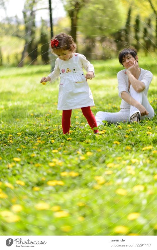 Mother and little girl playing in the park Lifestyle Joy Leisure and hobbies Garden Child Human being Feminine Baby Girl Woman Adults Family & Relations Infancy