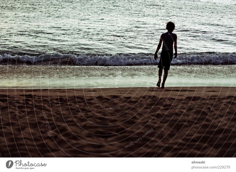 beach Human being Child Boy (child) 1 8 - 13 years Infancy Sand Water Waves Coast Beach Ocean Pacific Ocean Dark Serene Calm Loneliness Relaxation Colour photo
