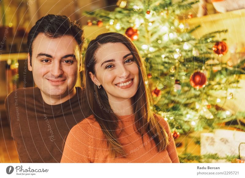 Happy Couple Portrait And Christmas Tree Lifestyle Beautiful Face Winter House (Residential Structure) Decoration Feasts & Celebrations Christmas & Advent