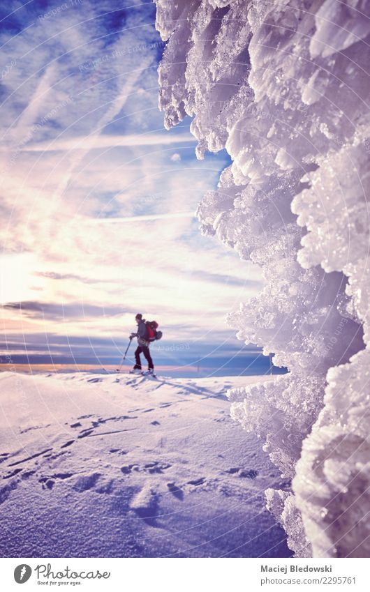 Ice formations with cross-country skier silhouette Vacation & Travel Tourism Adventure Expedition Winter Snow Mountain Skis Nature Landscape Sky Climate Effort
