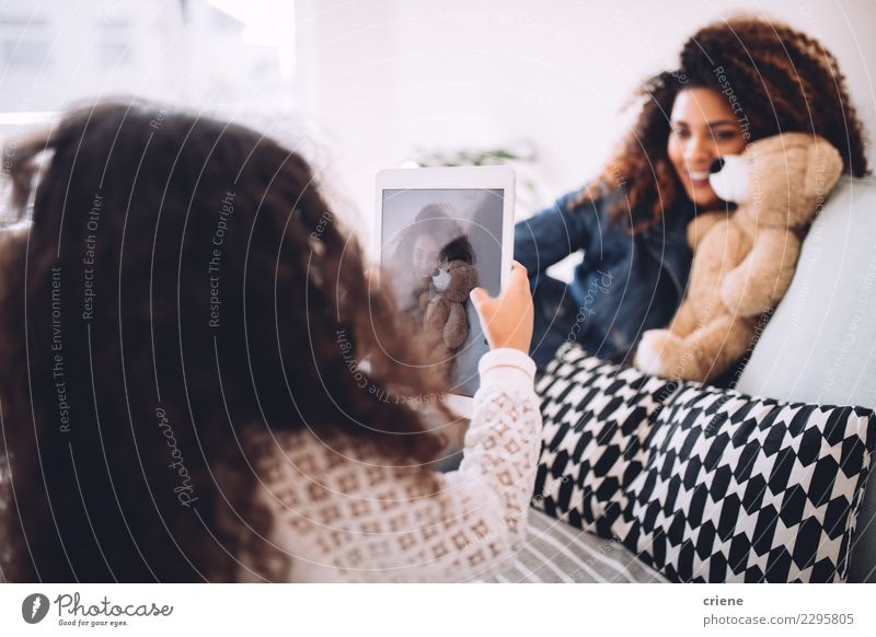 Little girl taking photo with tablet of her mother Lifestyle Joy Happy Beautiful Child Telephone Woman Adults Parents Mother Family & Relations Smiling Together