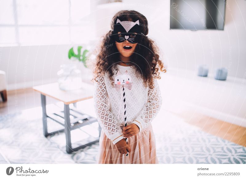 Happy Little girl in costume with cat mask at home Birthday Child Infancy Animal Fashion Dress Cat Small Cute Princess party young kids ballerina Colour photo