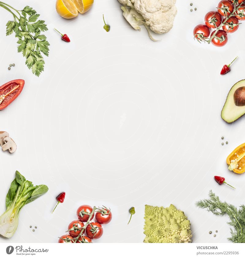 Salad vegetables frame on white background - a Royalty Free Stock Photo  from Photocase