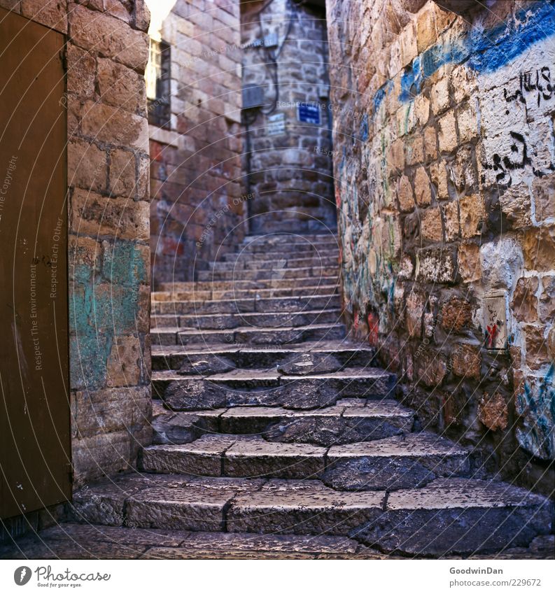 there it is written Old town Deserted Architecture Wall (barrier) Wall (building) Stairs Facade Exceptional Authentic Sharp-edged Simple Large Beautiful Gloomy