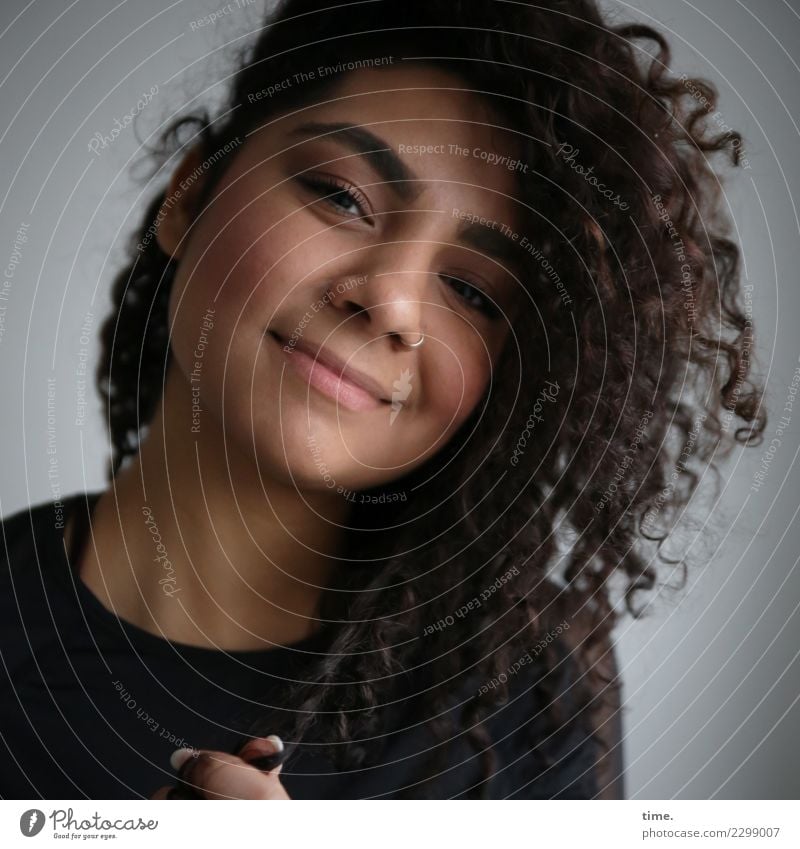 Nikoliya Feminine Woman Adults 1 Human being T-shirt Piercing Hair and hairstyles Brunette Long-haired Curl Observe Smiling Looking Friendliness Happiness Happy