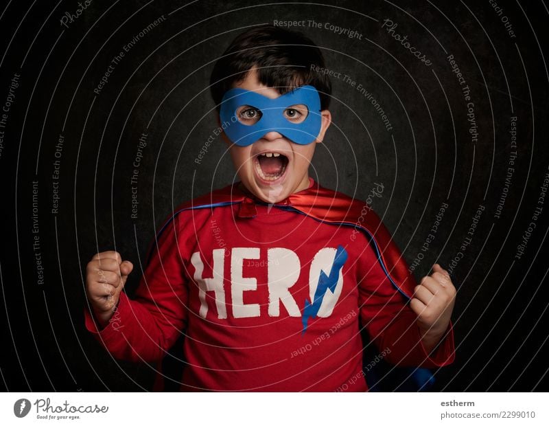 Happy little child playing superhero Lifestyle Joy Playing Entertainment Party Event Feasts & Celebrations Carnival Hallowe'en Human being Masculine Child