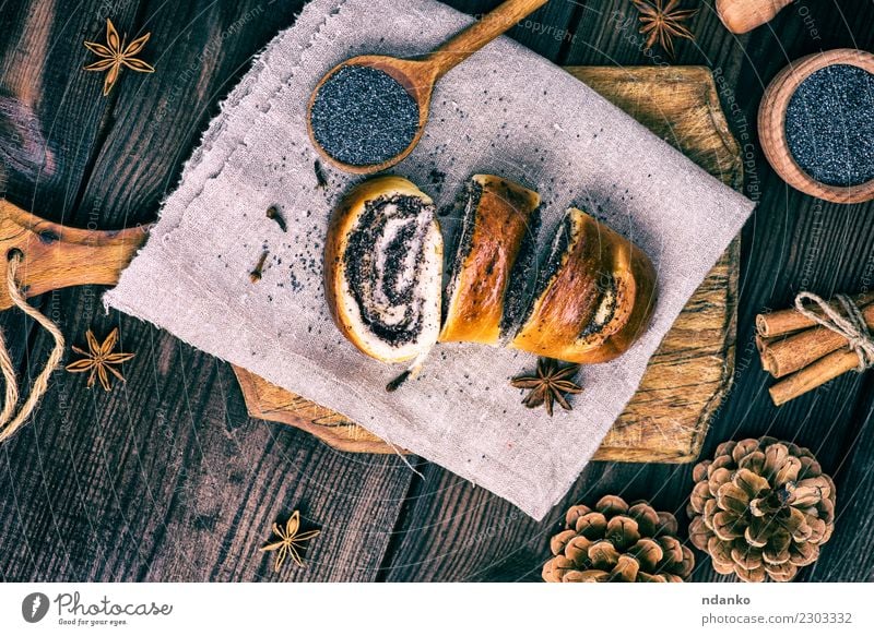 homemade roll with poppy seeds Bread Dessert Spoon Table Wood Eating Fresh Delicious Above Brown Tradition biscuit Chopping board Home-made Cut christmas Rustic