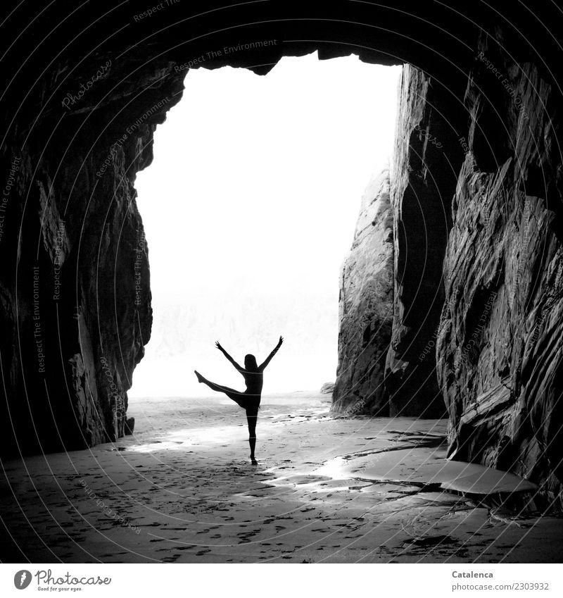 swinging | lifting the dancing leg, young woman dancing in the cave on the beach Leisure and hobbies Dance Dancer Ballet Feminine 1 Human being Nature Summer