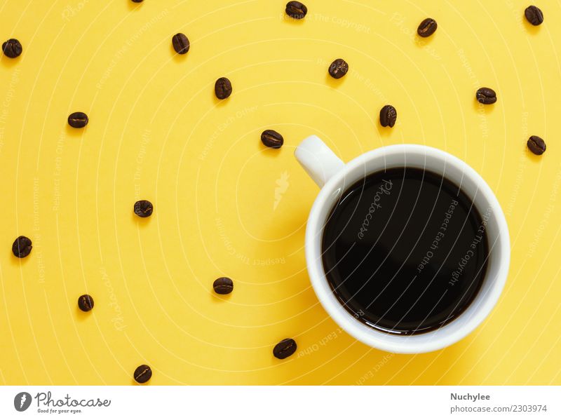Top view of black coffee and coffee beans on yellow Coffee Espresso Lifestyle Style Design Table Simple Modern Yellow Colour Idea Creativity lay flat Minimal