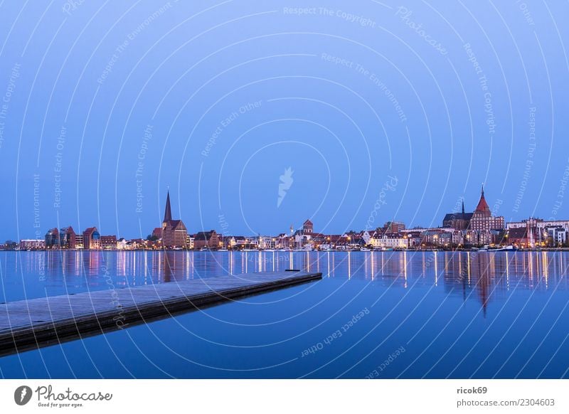 View over the Warnow to the city of Rostock in the evening Relaxation Vacation & Travel Tourism House (Residential Structure) Nature Landscape Water River Town