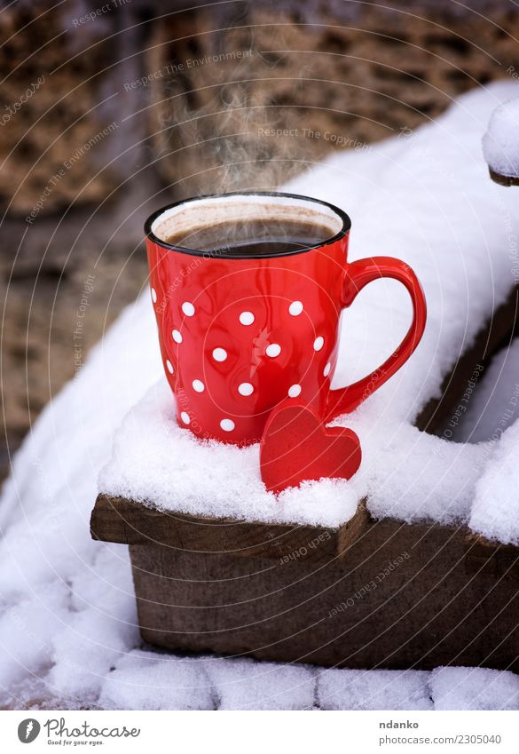 red ceramic cup with hot black coffee Breakfast To have a coffee Beverage Coffee Cup Winter Snow Valentine's Day Christmas & Advent New Year's Eve Landscape