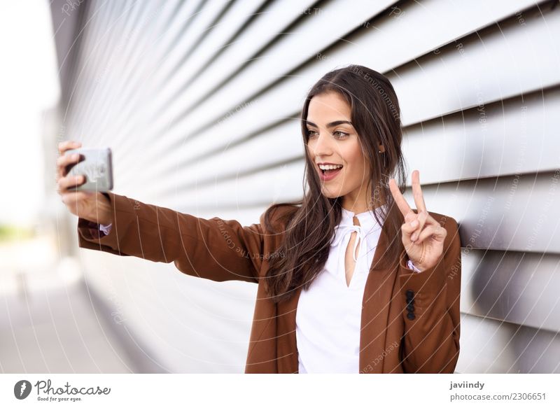 Young woman taking selfie photograph with smartphone Beautiful Hair and hairstyles Business Telephone PDA Technology Human being Youth (Young adults) Woman