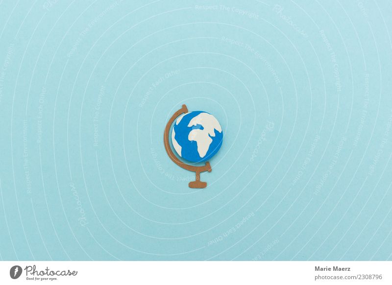 Handmade paper cut globe on light blue background Exotic Vacation & Travel Far-off places Freedom Expedition Discover Esthetic Infinity Uniqueness Curiosity