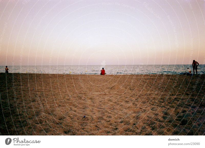 on the beach and in the middle of it Beach Spain Vacation & Travel Ocean Palm tree Red Lake Brown Waves Horizon Europe Water Sand Loneliness Coast Human being