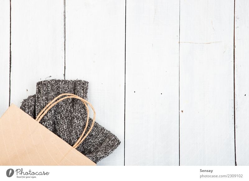 Womanly Woolen Clothes For Winter On Old Wooden Background Stock Photo -  Download Image Now - iStock