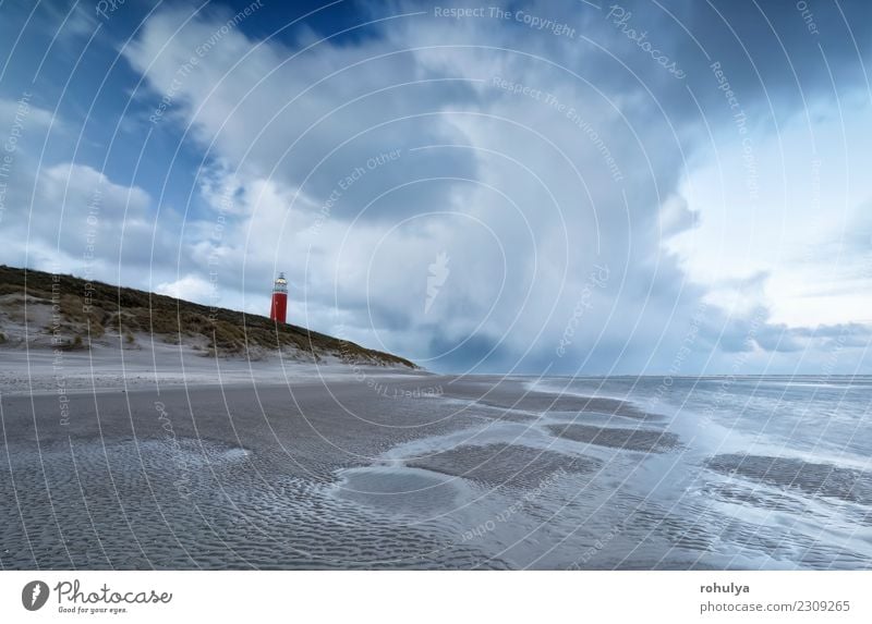 windy stormy morning on north sea coast with red lighthouse Vacation & Travel Beach Island Nature Landscape Sand Sky Clouds Weather Storm Coast North Sea