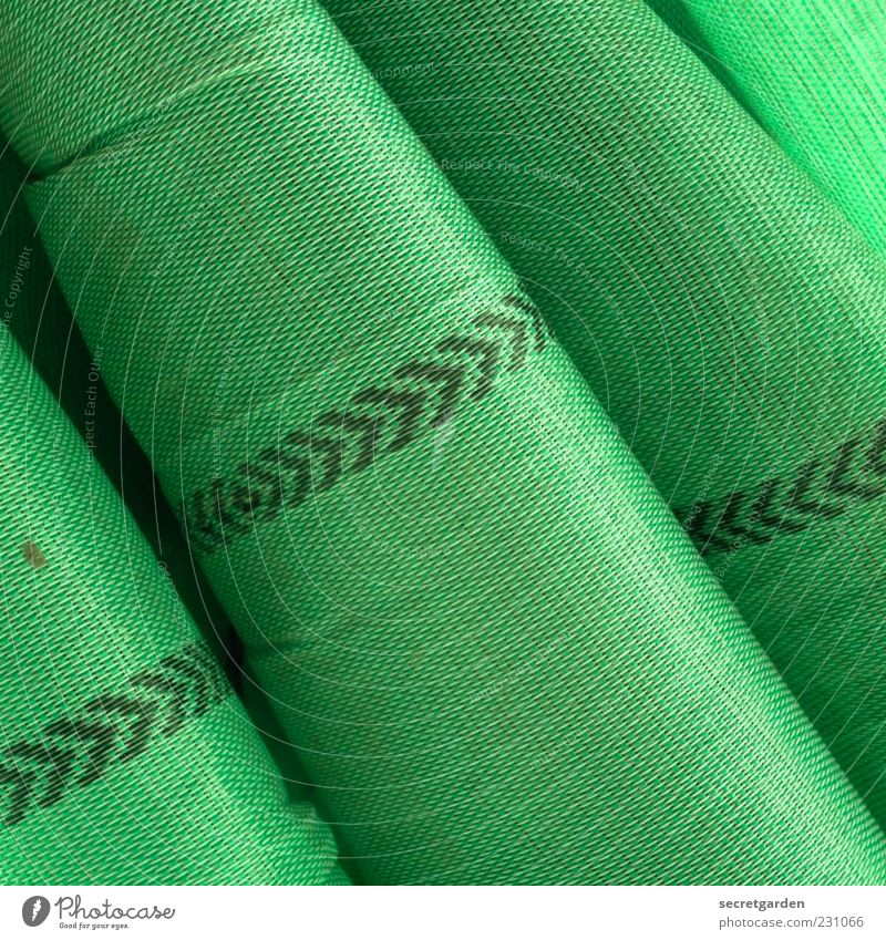 green change of direction. Plastic Arrow Green Upward Trend-setting Covers (Construction) Material Folds Wrinkles Folded cloth Cloth Cloth pattern Colour photo