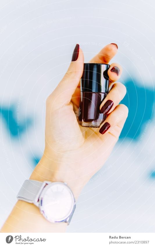 Woman Hand Holding A Bottle Of Red Nail Polish Lifestyle Elegant Style Design Beautiful Manicure Make-up Nail polish Wellness Clock Human being Feminine