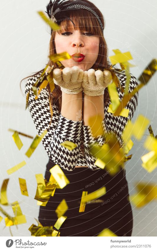 Woman blowing golden confetti into camera Human being Feminine Adults 1 Throw Beautiful Eroticism Blow Kissing Pout Disguised Glitter Confetti Gold Happiness