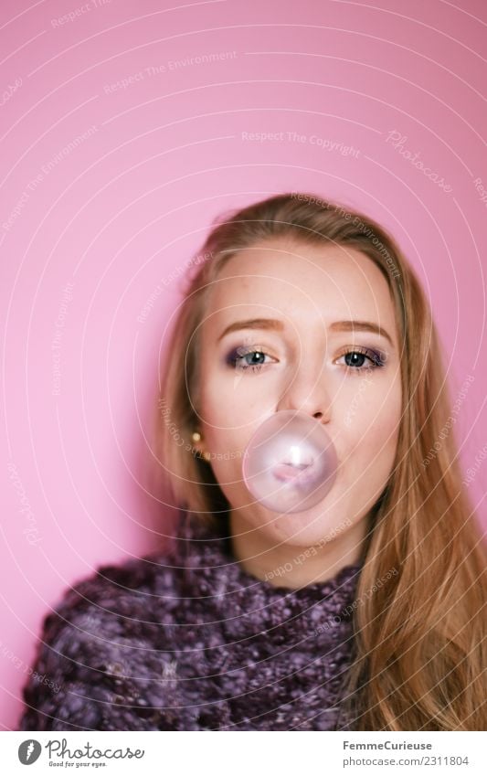 Young blonde woman making a chewing gum bubble Style Feminine Young woman Youth (Young adults) Woman Adults 1 Human being 18 - 30 years Joy Chewing gum bubble