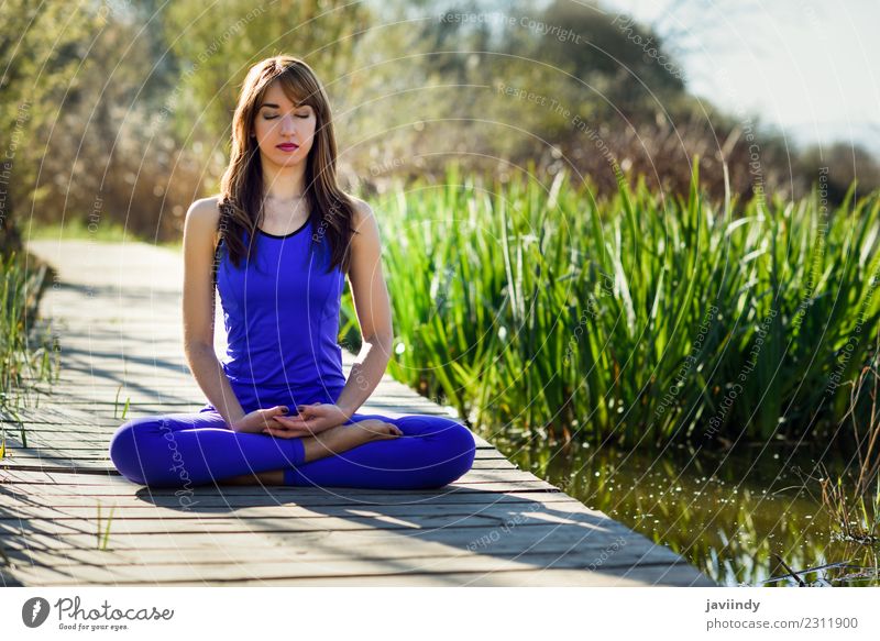 Young woman doing yoga in nature Lifestyle Body Relaxation Meditation Summer Sports Yoga Human being Youth (Young adults) Woman Adults 1 18 - 30 years Nature