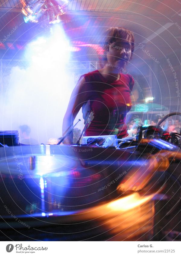 danci'n girl 1 Party Long exposure Techno Disco Night life Dance electro Disc jockey Record player Motion blur Young woman Party goer Interior shot Flare
