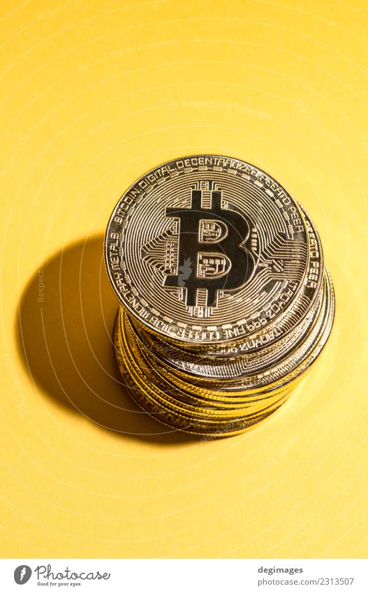 Bitcoin stack on yellow background Money Success Economy Financial Industry Financial institution Business Metal Growth Yellow Gold Cryptocurrency Stack