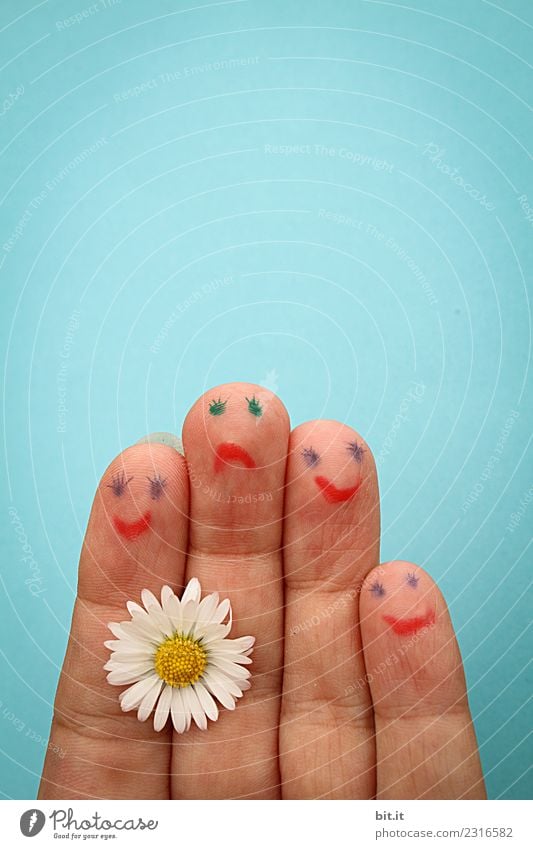 Hand with painted smilies and daisies in front of a blue wall Handcrafts Valentine's Day Mother's Day Birthday Kindergarten Human being Infancy Fingers