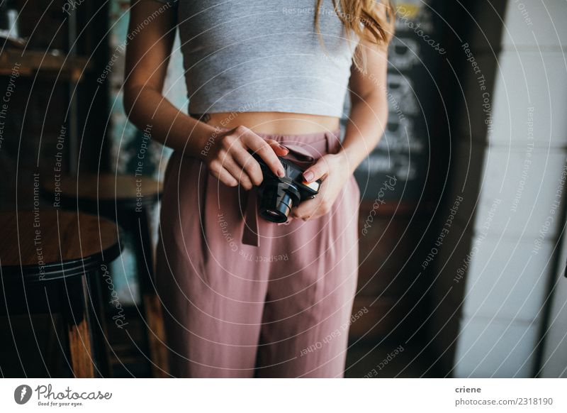 Cute teen girl in crop top smiling at camera Stock Photo