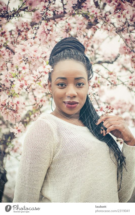 Almond blossom Lifestyle Elegant Style Hair and hairstyles Young woman Youth (Young adults) Africans Nature Spring Flower Almond tree Cherry tree Cherry blossom