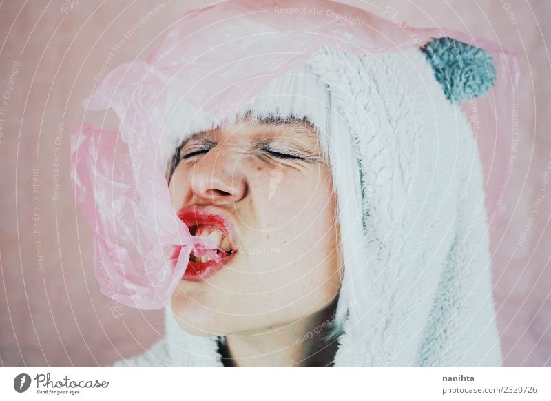 Funny portrait of a young woman eating a bubble gum Food Candy Chewing gum Eating Lifestyle Style Design Exotic Face Human being Feminine Androgynous