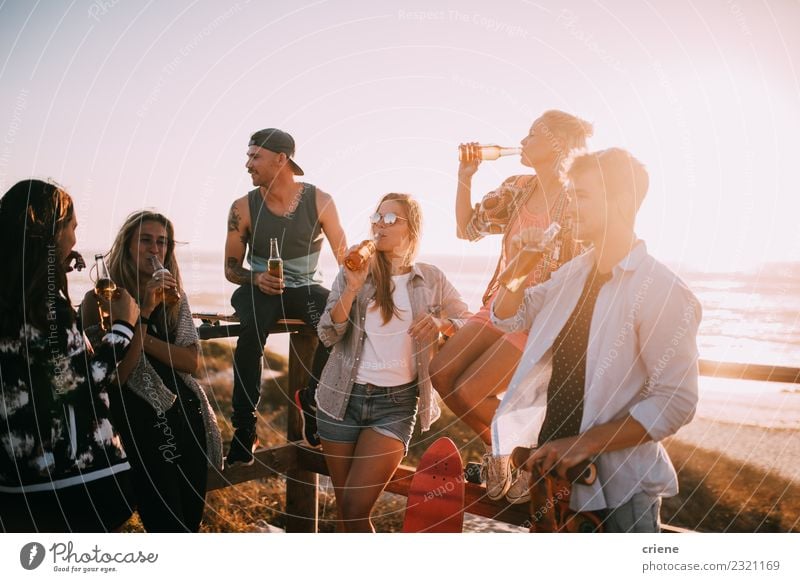 Group of young adult friends drinking beer at the beach party Beverage Drinking Alcoholic drinks Beer Joy Happy Leisure and hobbies Vacation & Travel Freedom