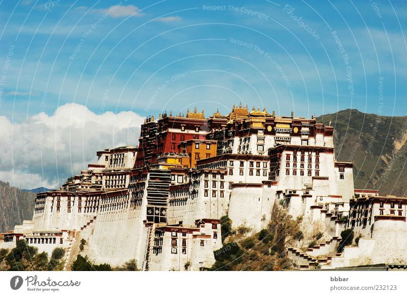 Potala Palace in Lhasa Tibet Vacation & Travel Winter Culture Sky Capital city Old town Castle Building Architecture Tourist Attraction Landmark Blue Yellow Red