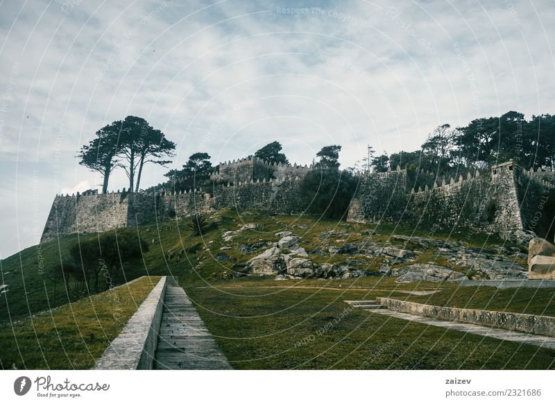 Wall and stone castle in winter on a hill in Baiona, Galicia Spain Beautiful Vacation & Travel Tourism Trip Winter Garden Nature Landscape Sky Bad weather Park