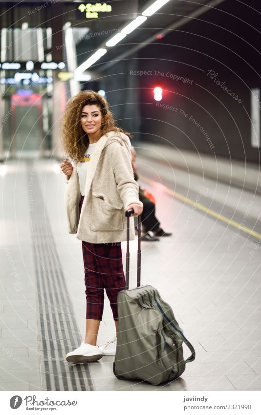 Young woman waiting her train in a subway station Lifestyle Style Vacation & Travel Tourism Trip Human being Youth (Young adults) Woman Adults 1 18 - 30 years