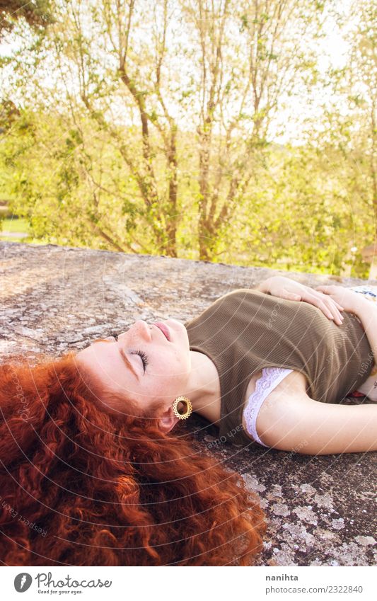 Young and redhead woman is having a sun bath Lifestyle Style Beautiful Healthy Wellness Harmonious Senses Relaxation Calm Meditation Vacation & Travel Freedom