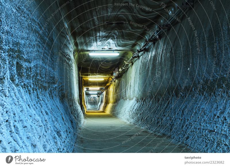 illuminated tunnel in mine Tourism Industry Earth Rock Architecture Lanes & trails Old Dirty Dark Creepy Historic Black salt underground Geology mineral