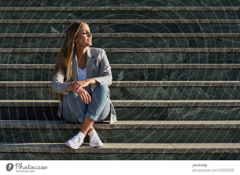 Blonde woman with eyes closed in urban steps Lifestyle Style Beautiful Hair and hairstyles Human being Feminine Young woman Youth (Young adults) Woman Adults 1