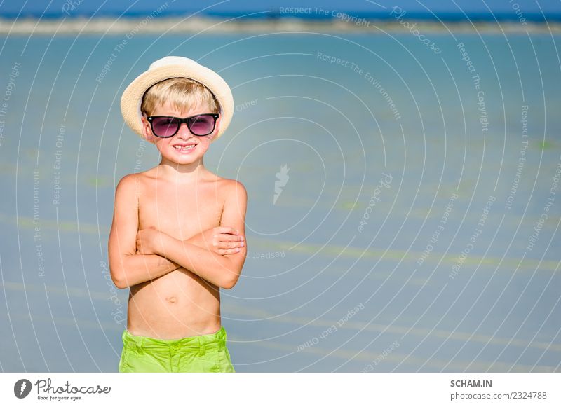 Handsome boy on the desert sunny beach Lifestyle Joy Playing Summer Ocean Island Human being Child Boy (child) Infancy 1 3 - 8 years Landscape Beautiful weather