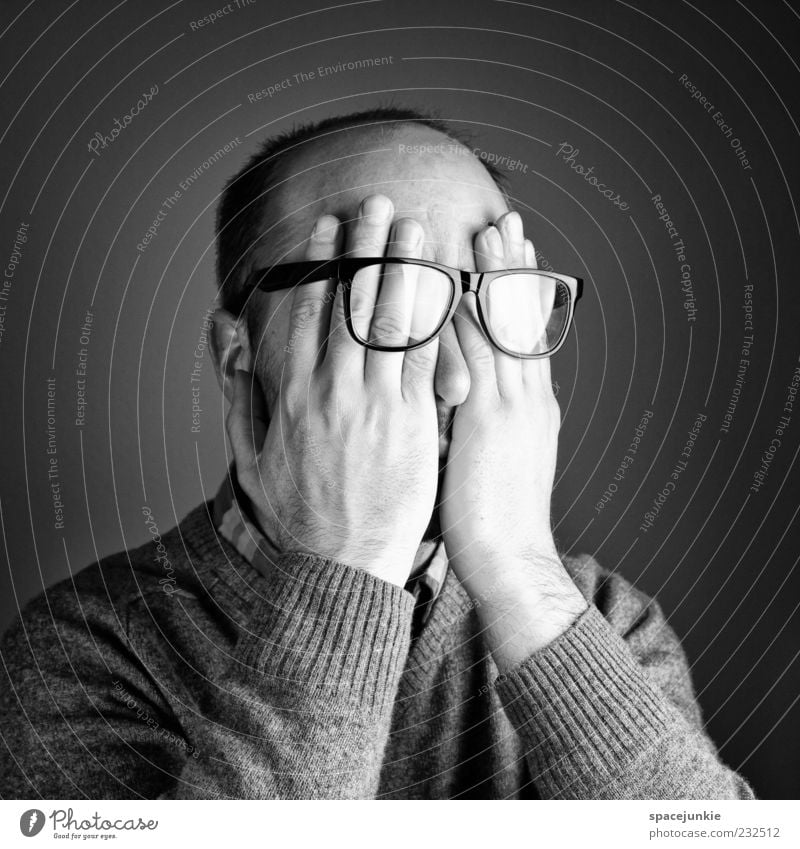shy Human being Masculine Man Adults Head Hand 1 30 - 45 years Cry Disappointment Loneliness Perturbed Timidity Mysterious Eyeglasses Person wearing glasses