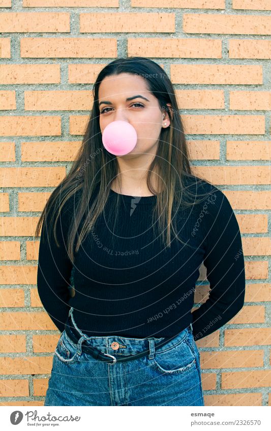 portrait of young girl with a bubble gum on brick background Chewing gum Lifestyle Joy Cosmetics Healthy Illness Wellness Human being Young woman