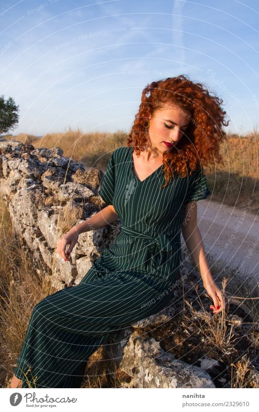 Young redhead woman enjoying the sunset outdoors Lifestyle Elegant Style Wellness Harmonious Relaxation Calm Vacation & Travel Summer Summer vacation