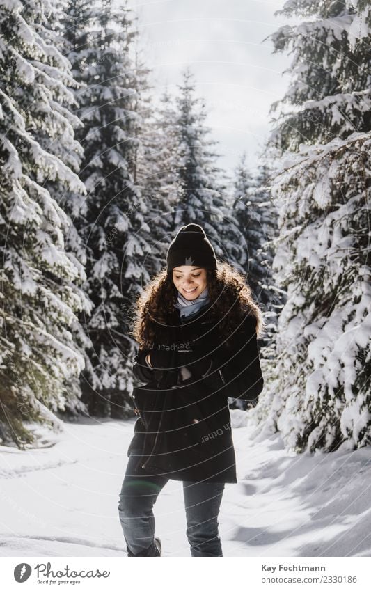 Young woman trudges through winter forest Joy Happy Wellness Life Harmonious Well-being Contentment Vacation & Travel Tourism Trip Far-off places Freedom Winter