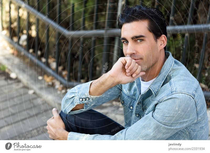 young man with modern hairstyle - a Royalty Free Stock Photo from Photocase