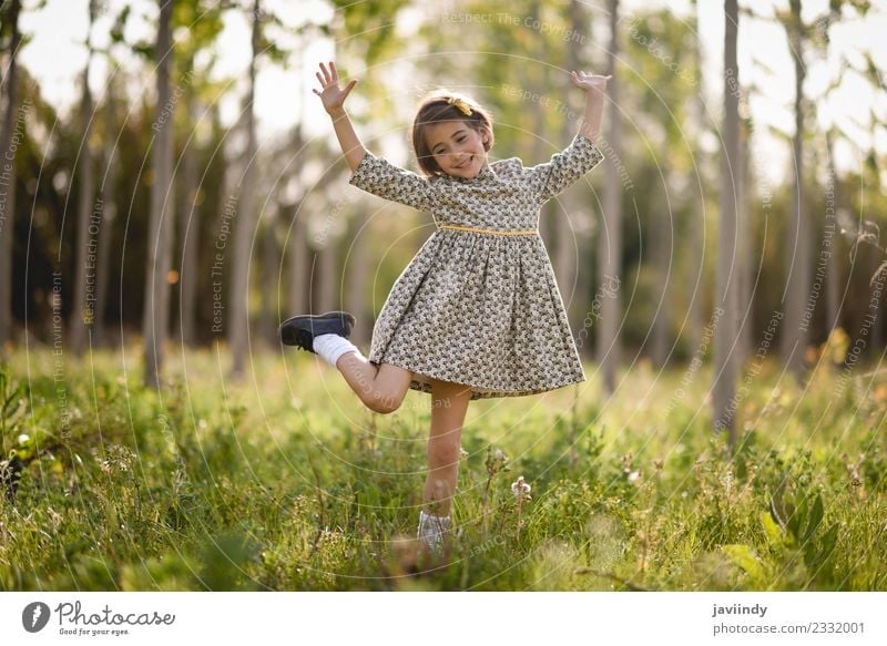 Little girl in nature field wearing beautiful dress Lifestyle Joy Happy Beautiful Playing Summer Child Human being Feminine Baby Girl Woman Adults Infancy 1