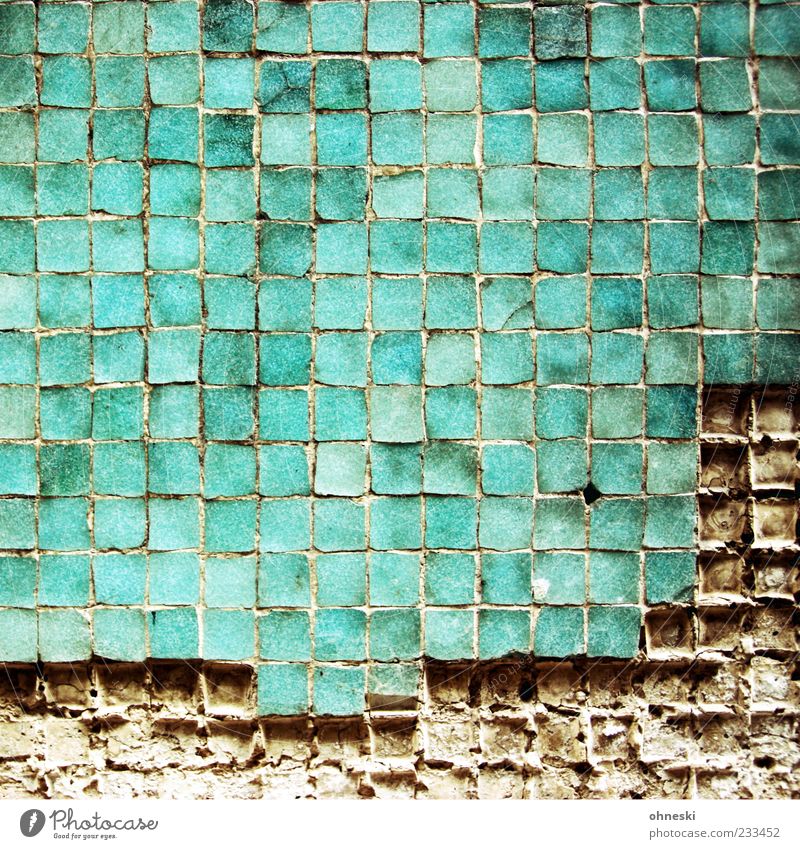 erosion Manmade structures Architecture Wall (barrier) Wall (building) Facade Tile Mosaic Broken Green Turquoise Seam Colour photo Exterior shot Abstract