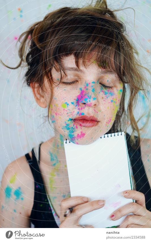 Young artist woman with paint in her face is holding a notebook Style Design Beautiful Make-up Student Apprentice Human being Feminine Young woman