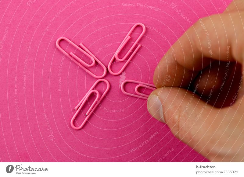 four paperclips together Fingers Select To hold on Communicate Together Feminine Pink Uniqueness Accuracy Contentment Equal Team Teamwork Attachment Paper clip