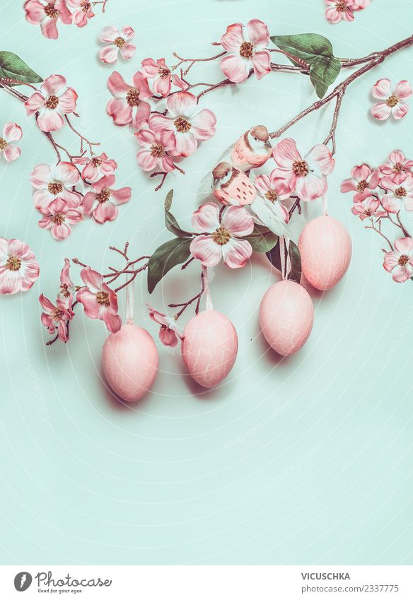 Hanging Easter eggs and pastel pink flowers on turquoise Style Design Joy Decoration Spring Blossom Ornament Blue Pink Turquoise Tradition Conceptual design